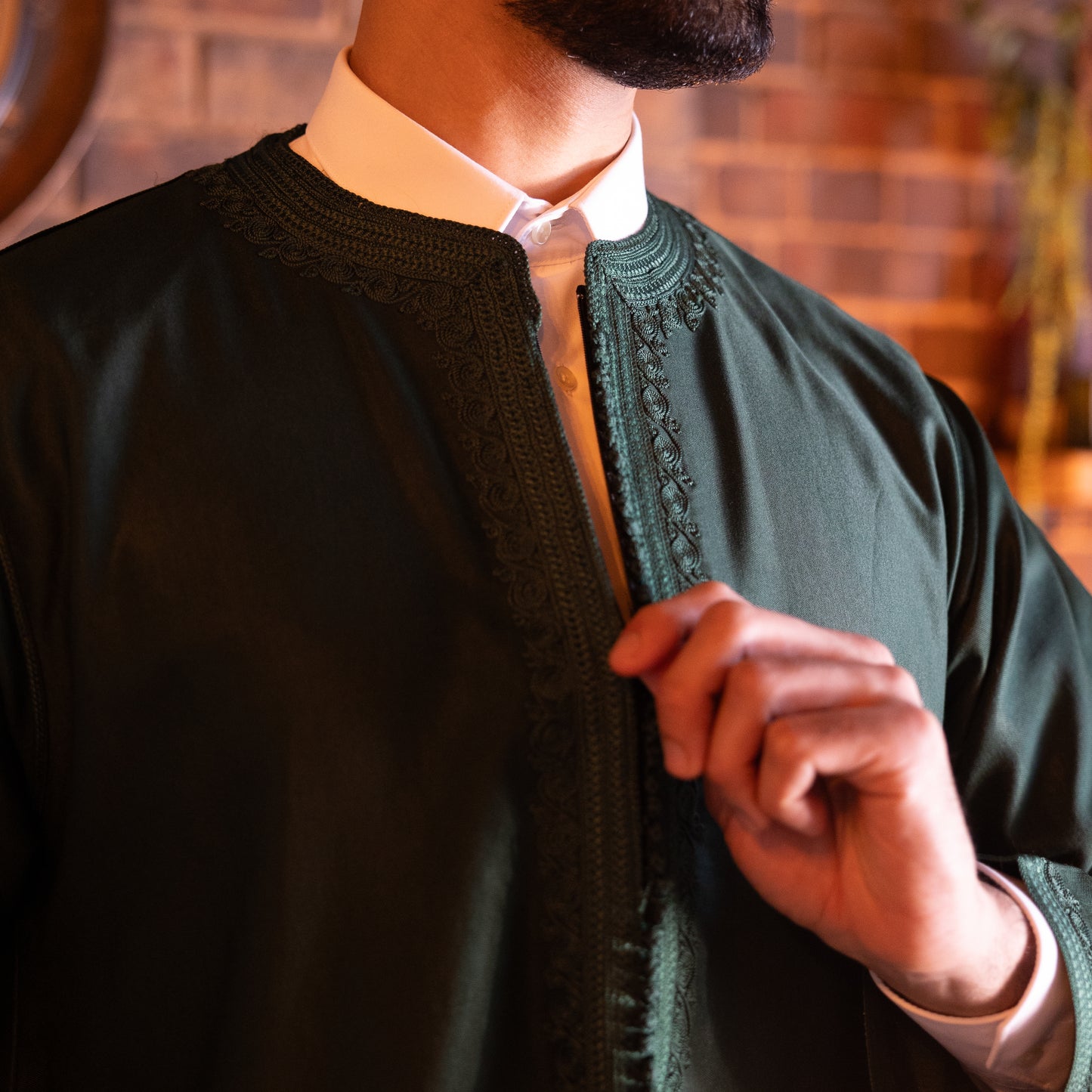 Model wearing the stunning Emerald Green Kaftan to showcase its luxurious flow and perfect fit