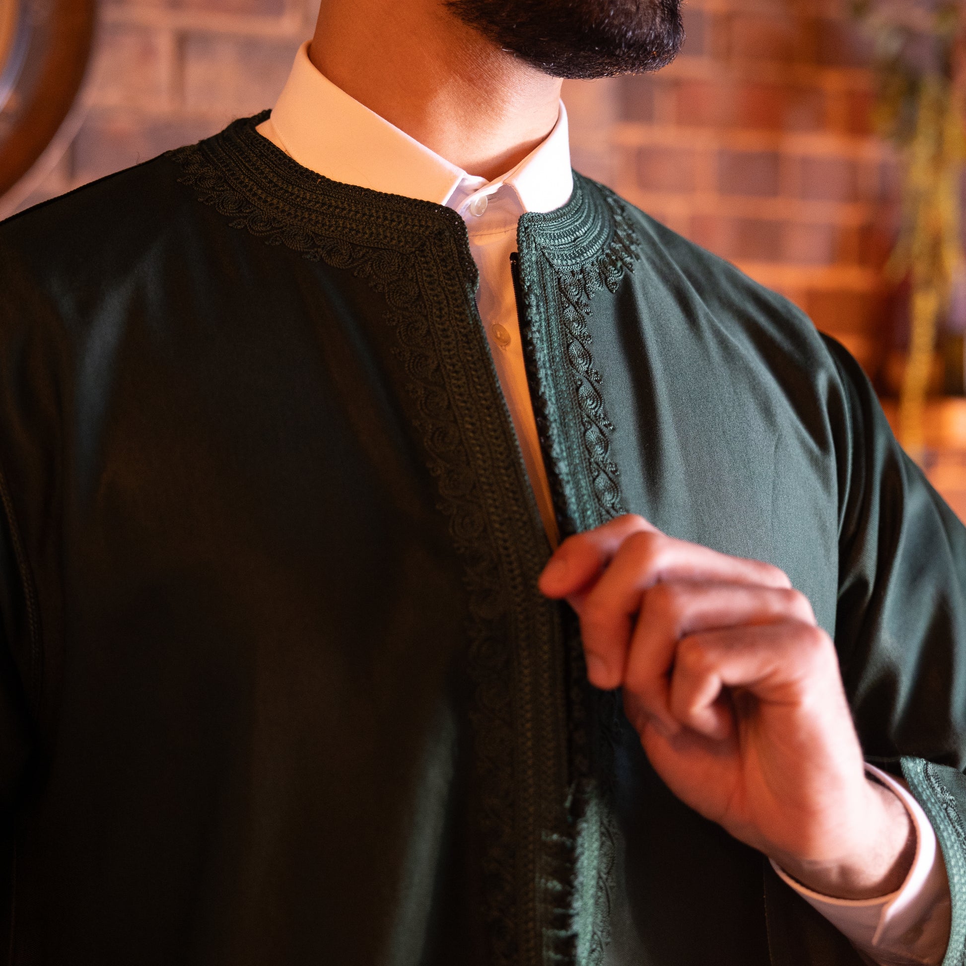 Model wearing the stunning Emerald Green Kaftan to showcase its luxurious flow and perfect fit