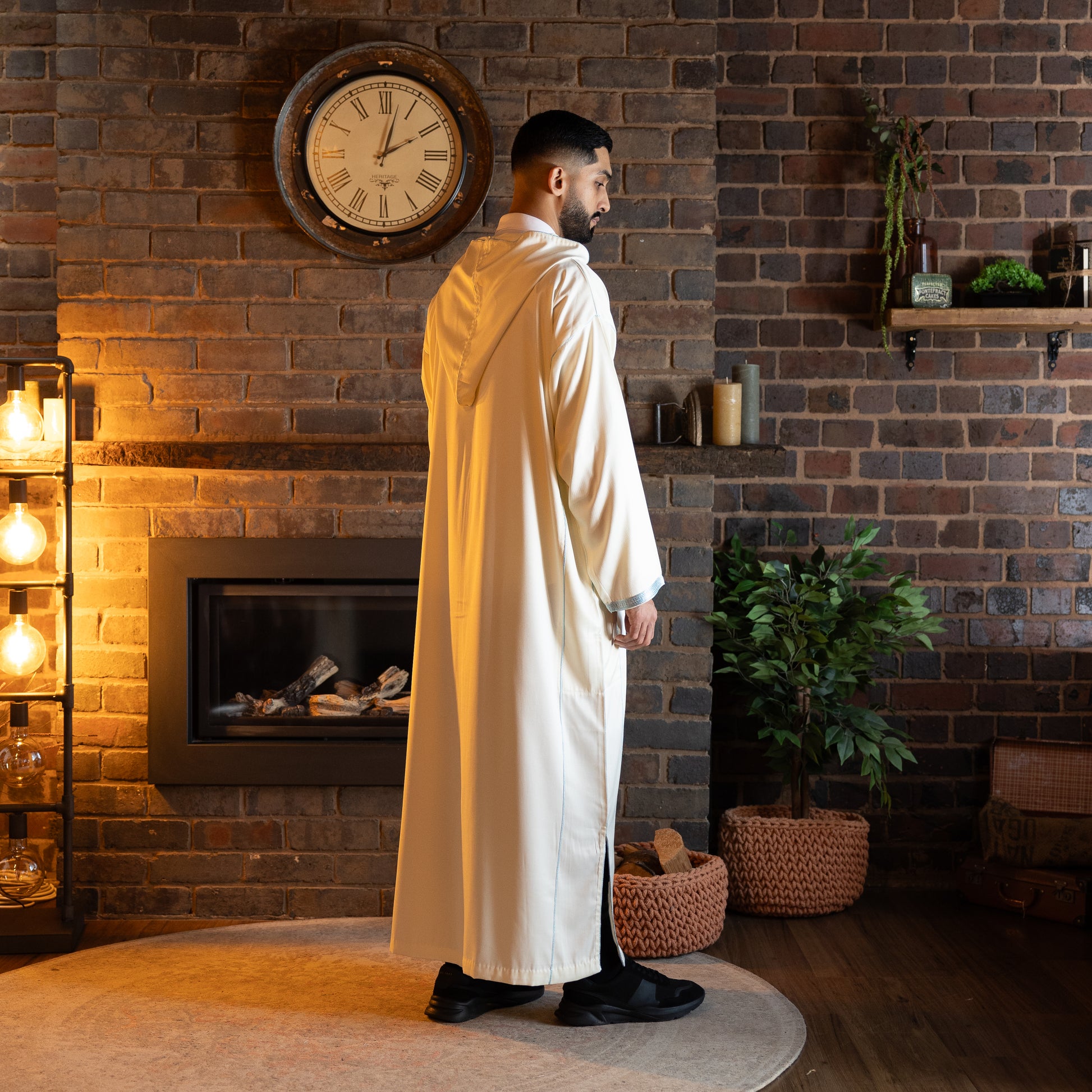 Back view of elegant pearl and sky Moroccan djellaba