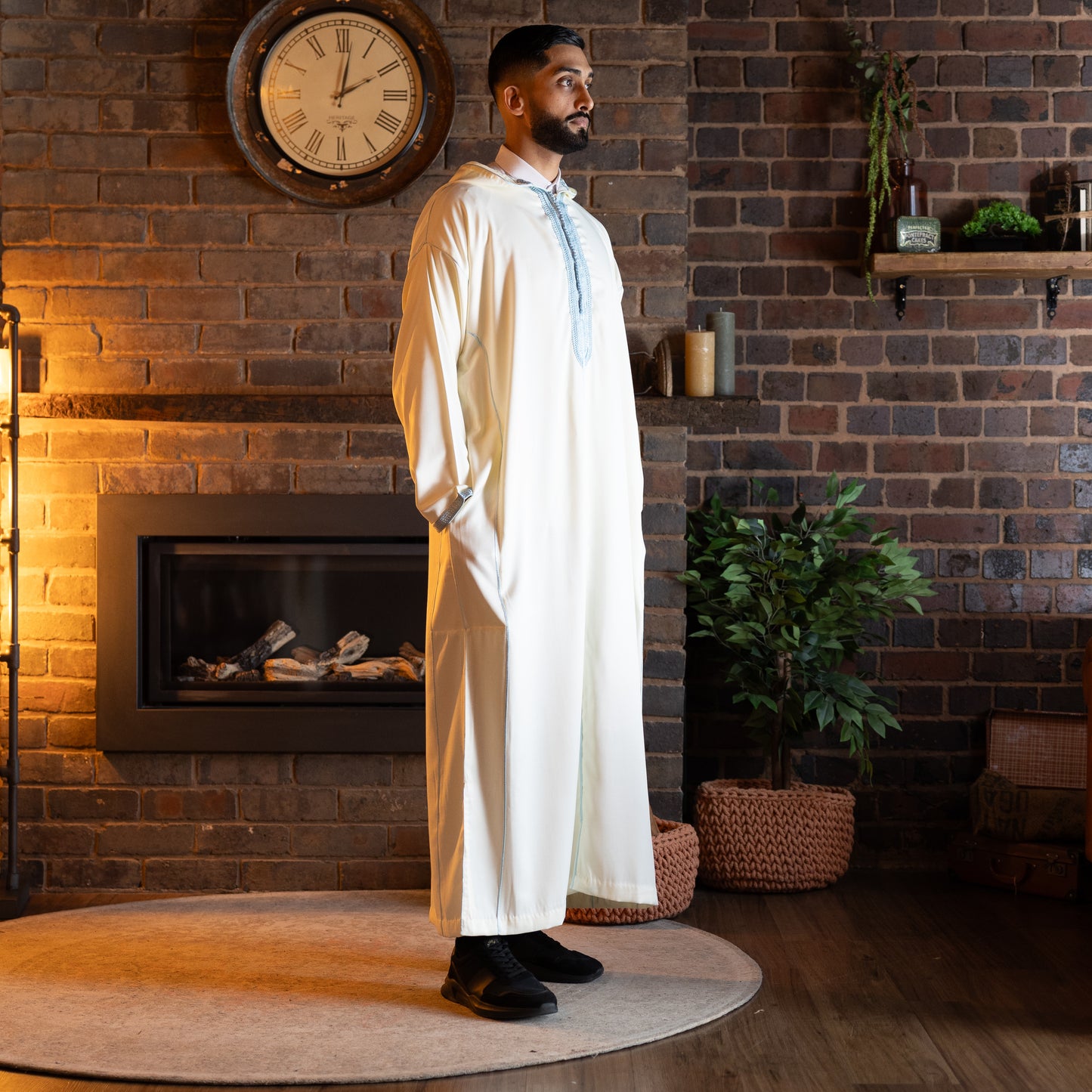 Side view of traditional pearl and sky Moroccan djellaba for men